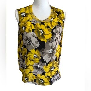 Who What Wear black, yellow and taupe floral sleeveless blouse.